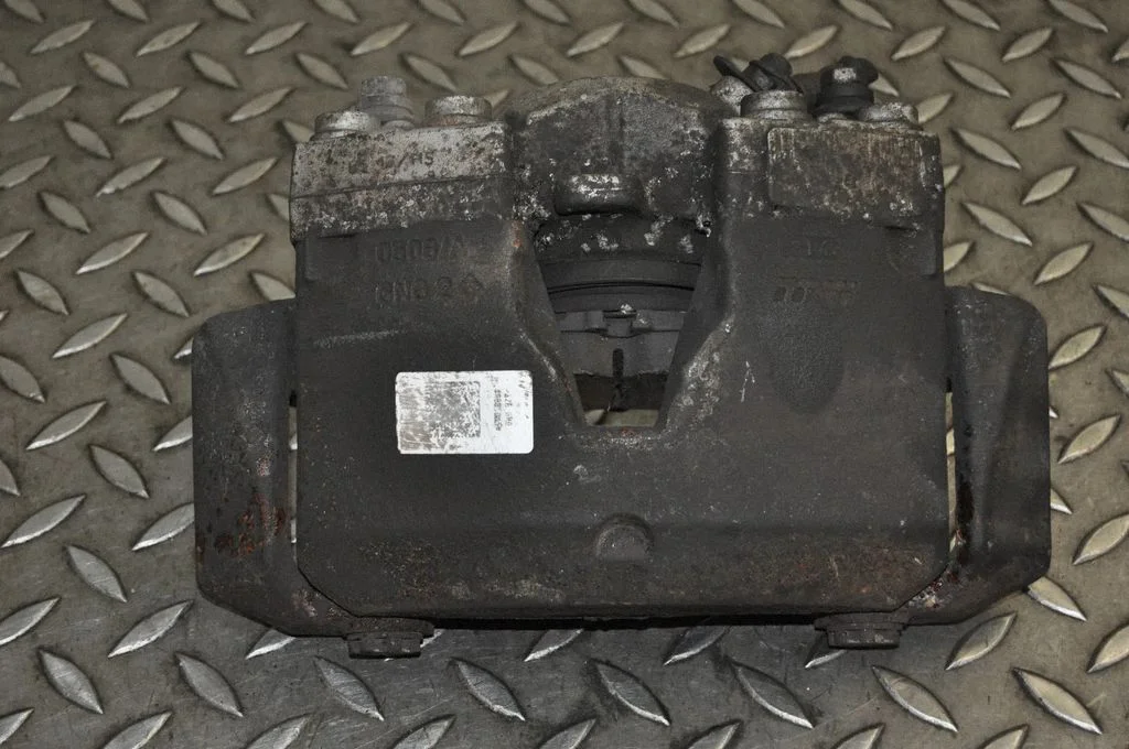 Front brake caliper 32348422