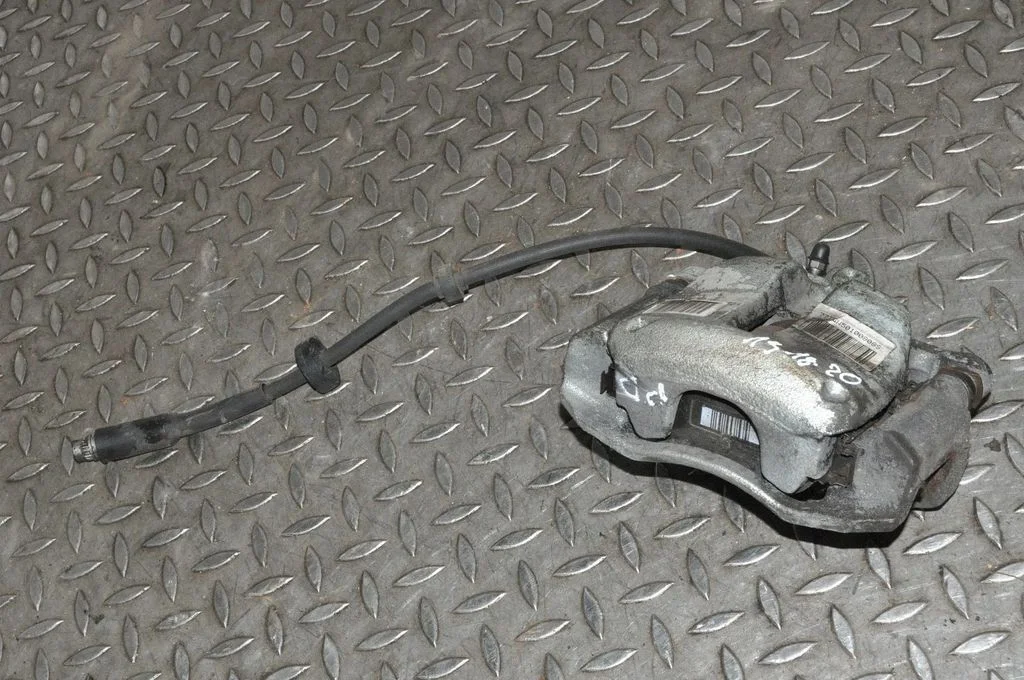 Front brake caliper – right