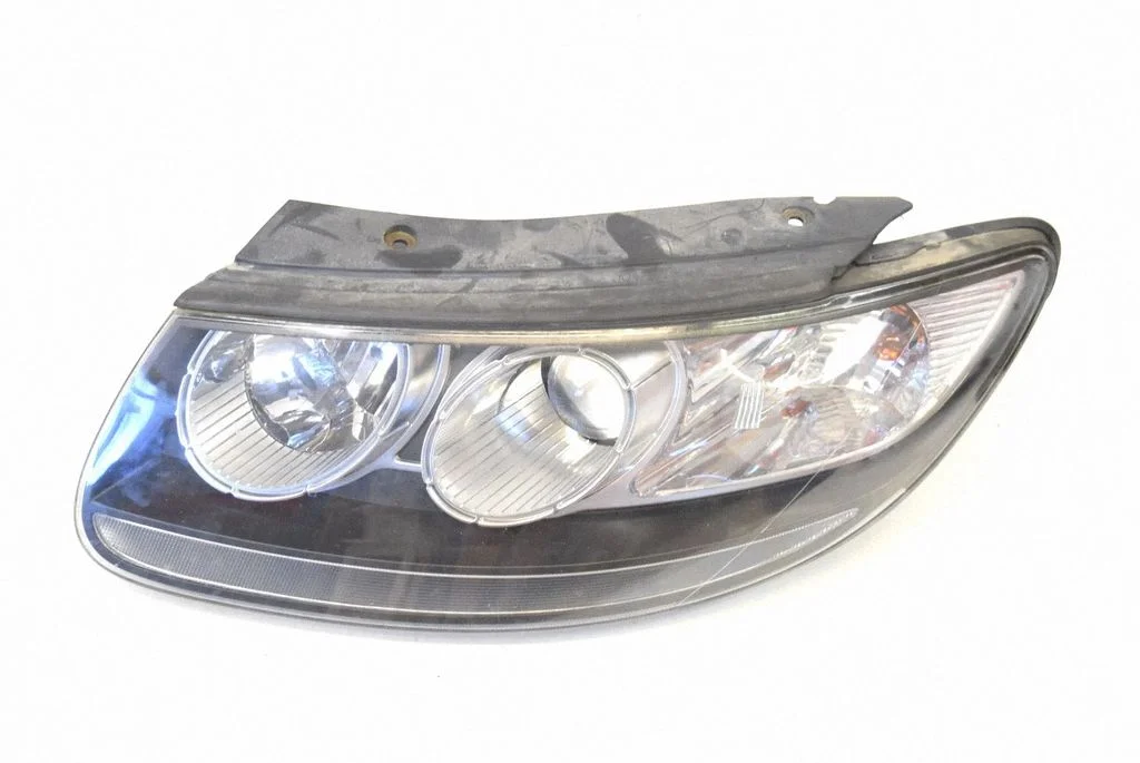 Headlight/headlamp – left