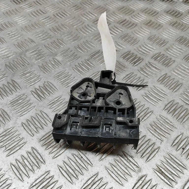 Headlight/headlamp mounting bracket 260425SK0A