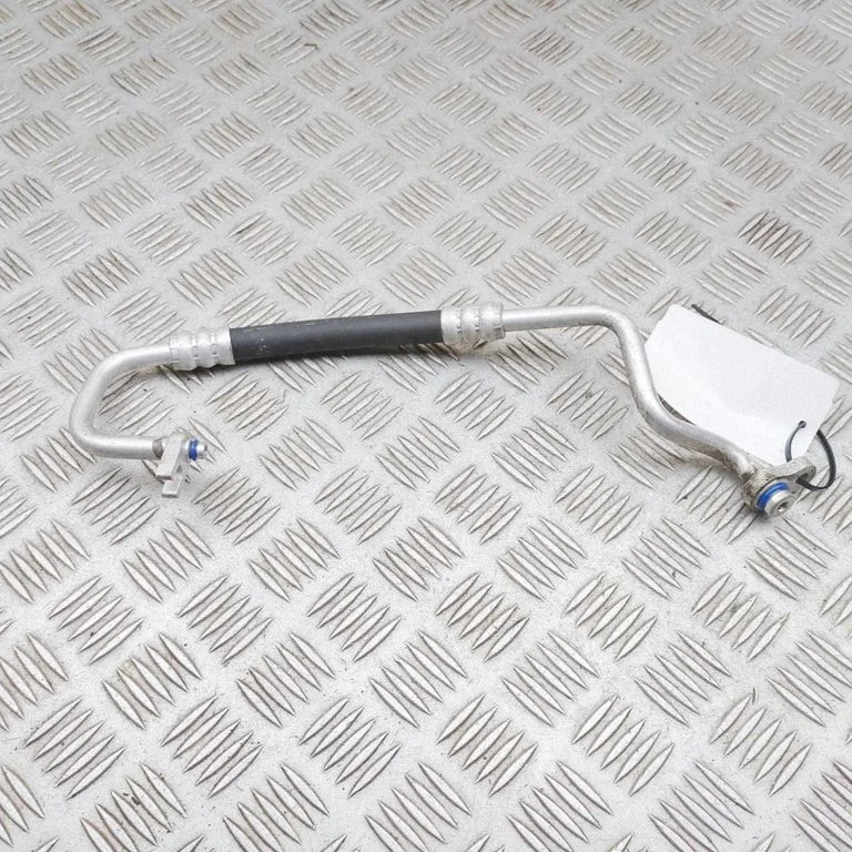 Air conditioning (A/C) pipe/hose 97772CV000