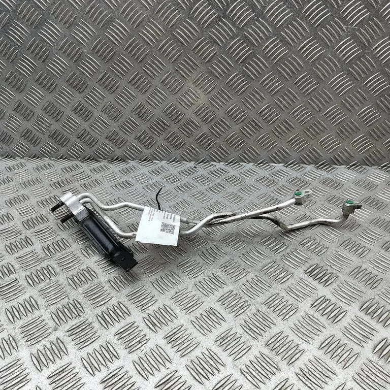 Air conditioning (A/C) pipe/hose 97761KL100