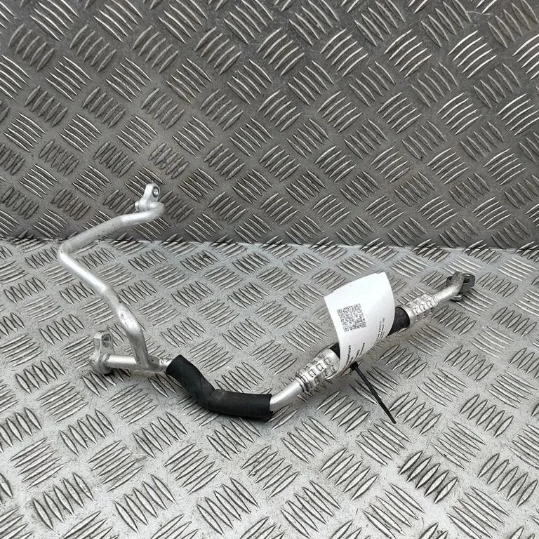 Air conditioning (A/C) pipe/hose 97759KL560