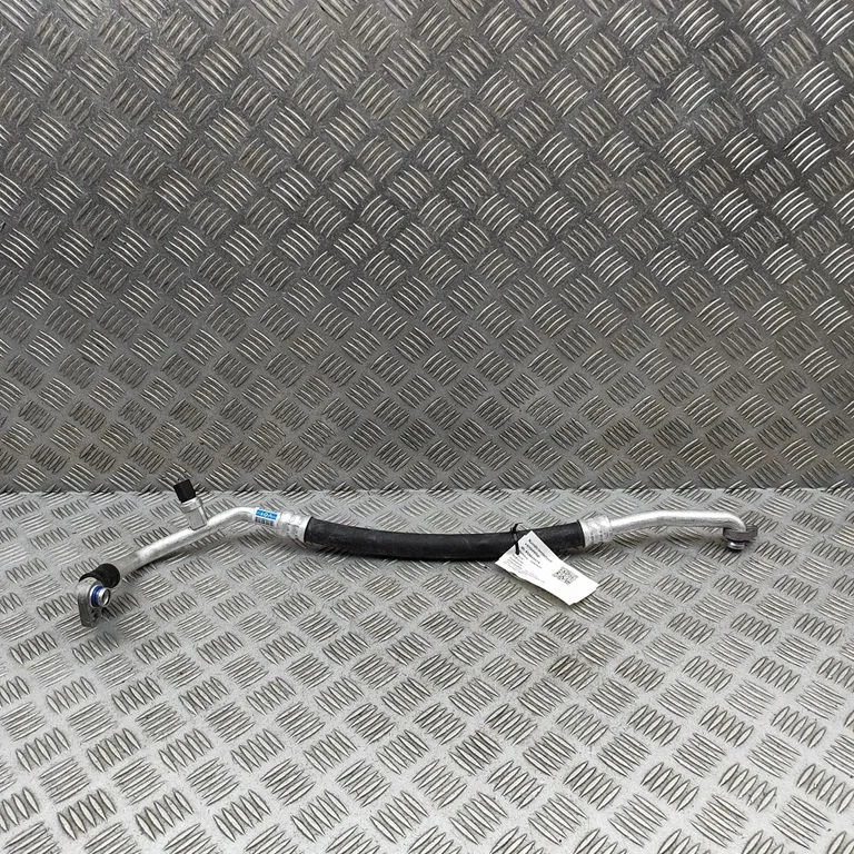 Air conditioning (A/C) pipe/hose 97763AO010