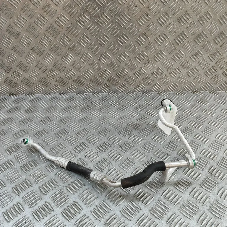 Air conditioning (A/C) pipe/hose 97759KL580