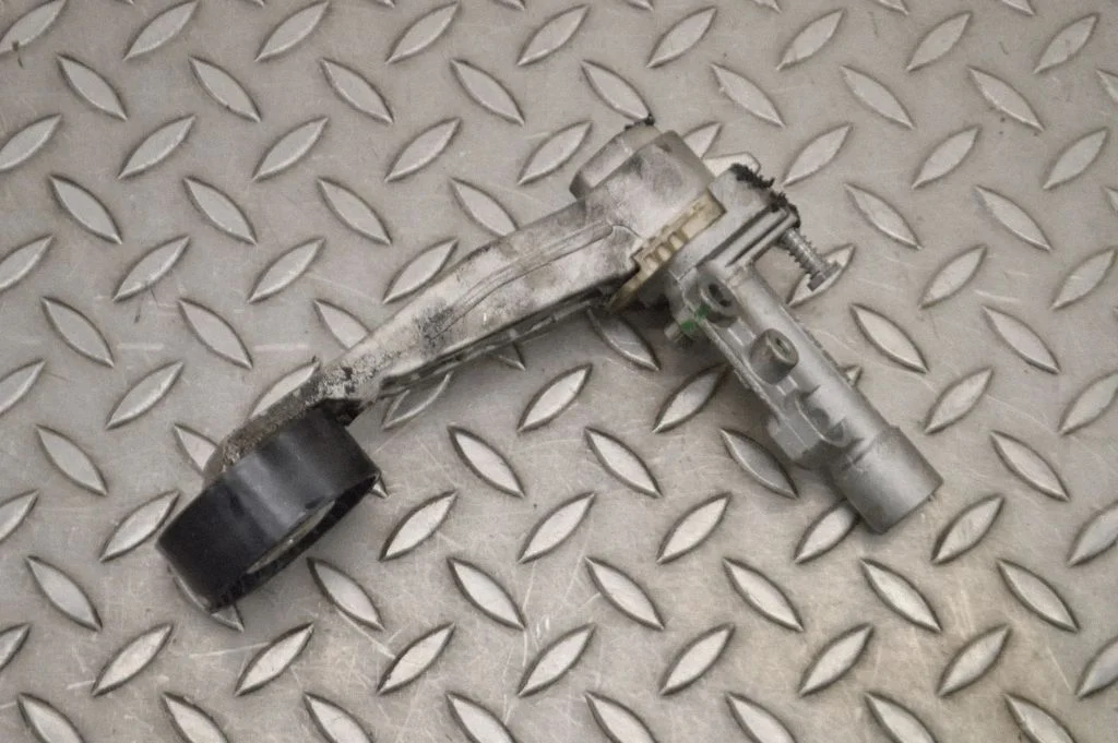 Generator/alternator belt tensioner