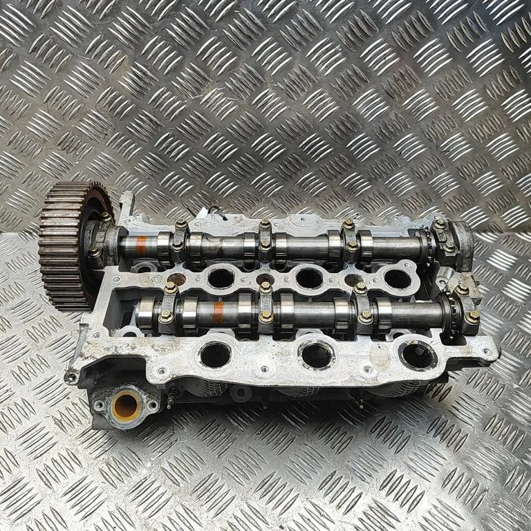 Engine head 4U3Q6K286AB