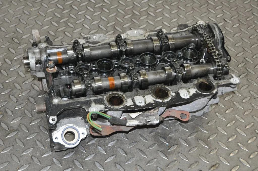 Engine head PM9X2Q609CA
