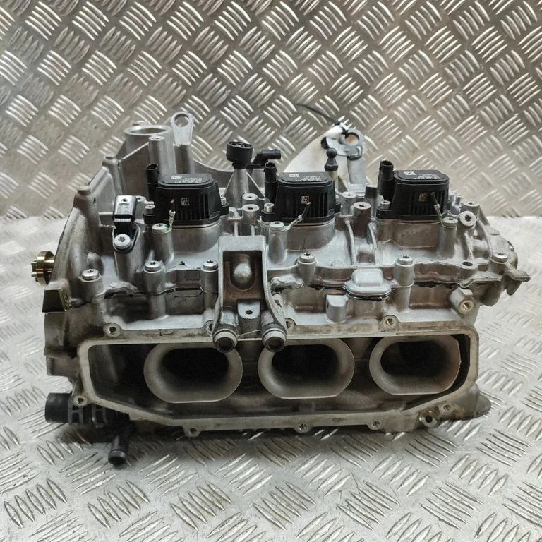 Dzinēja galva 06M103404AF