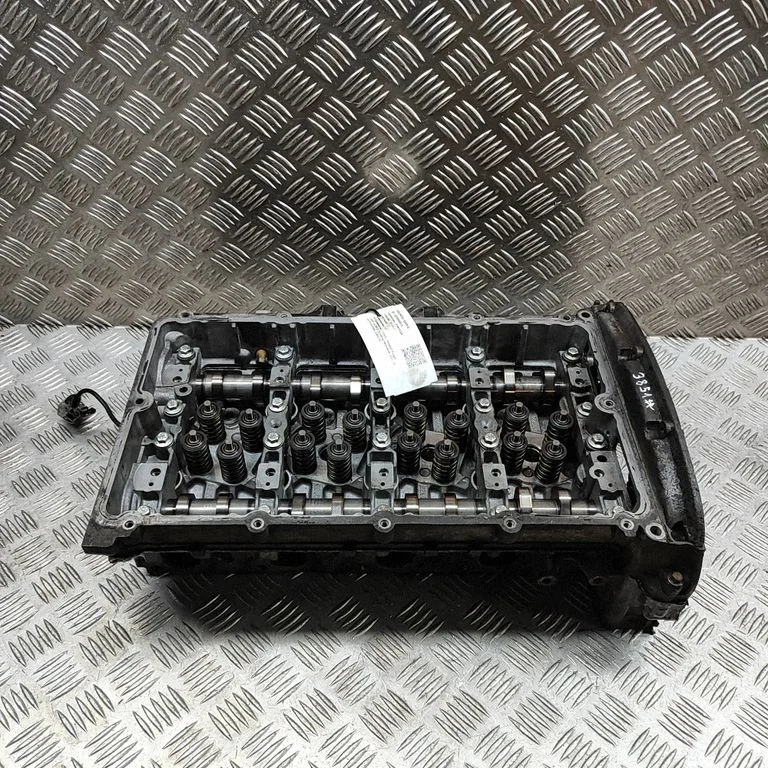 Dzinēja galva 6C1Q6090AE