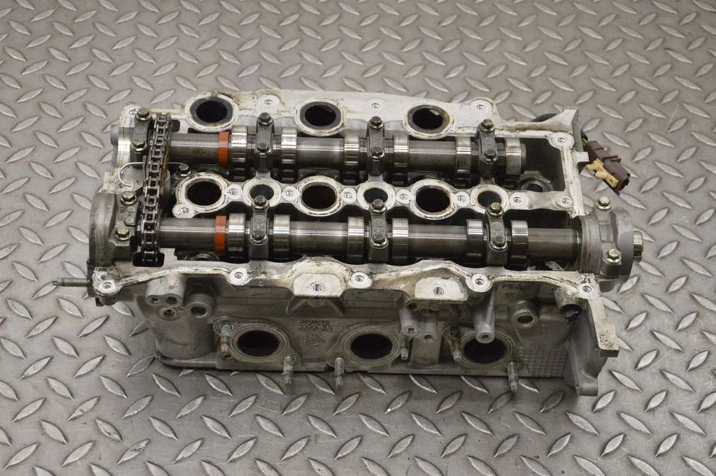 Engine head PM9X2Q6090DA