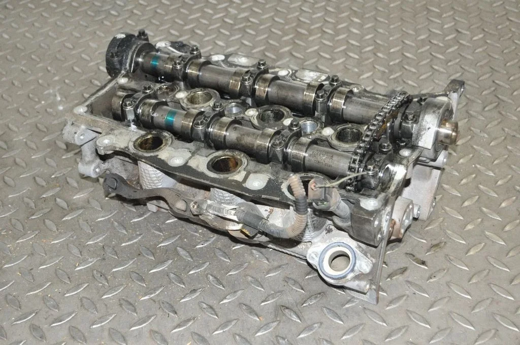 Engine head PM9X2Q6C064CA