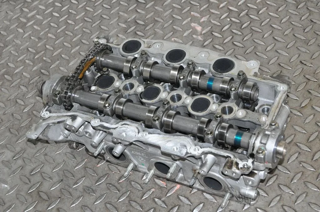 Engine head 9X2Q6C064DA