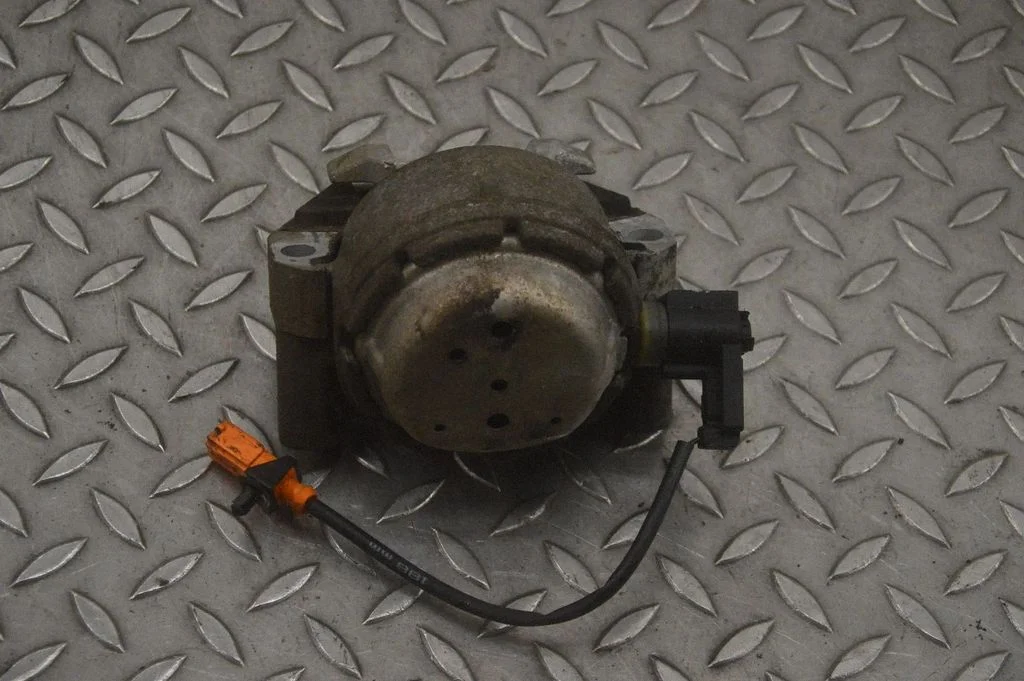 Engine mount bracket – left