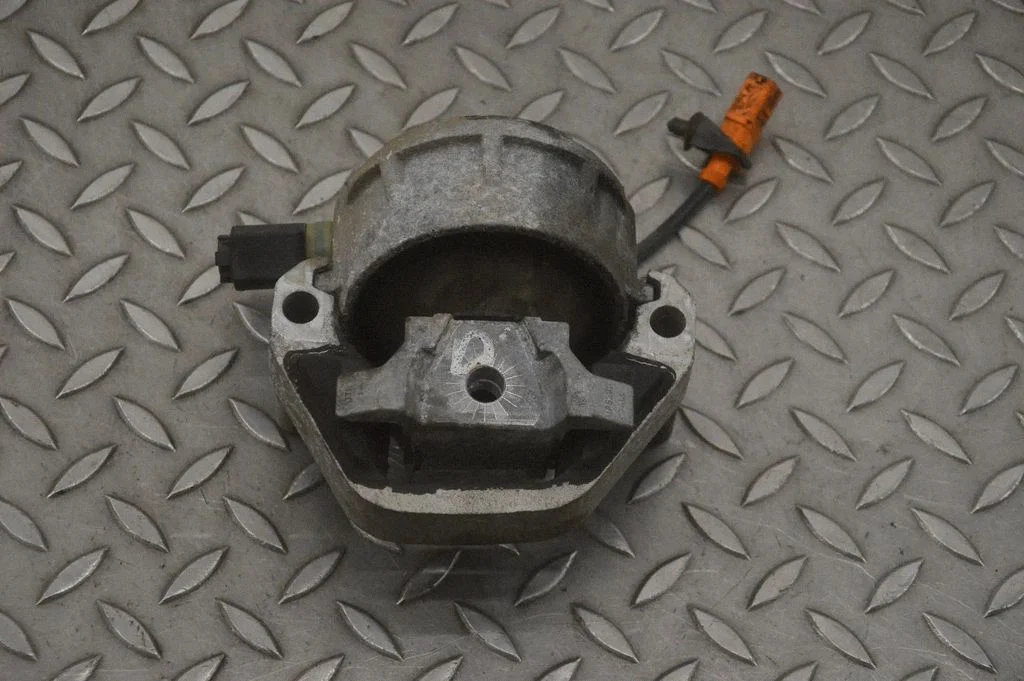 Engine mount bracket – right
