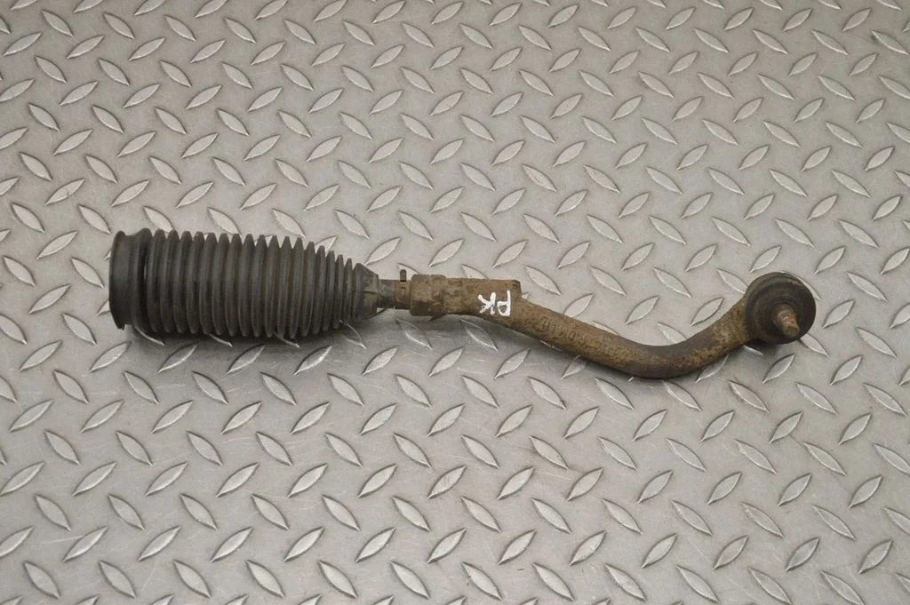 Steering tie rod – left