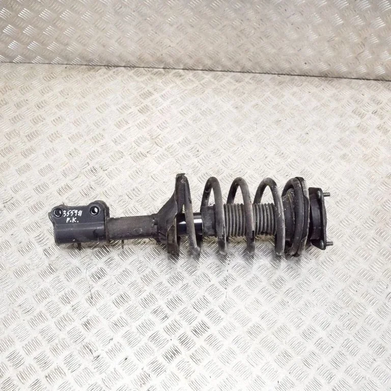 Front shock absorber/damper – left