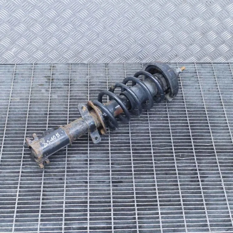Front shock absorber/damper – left