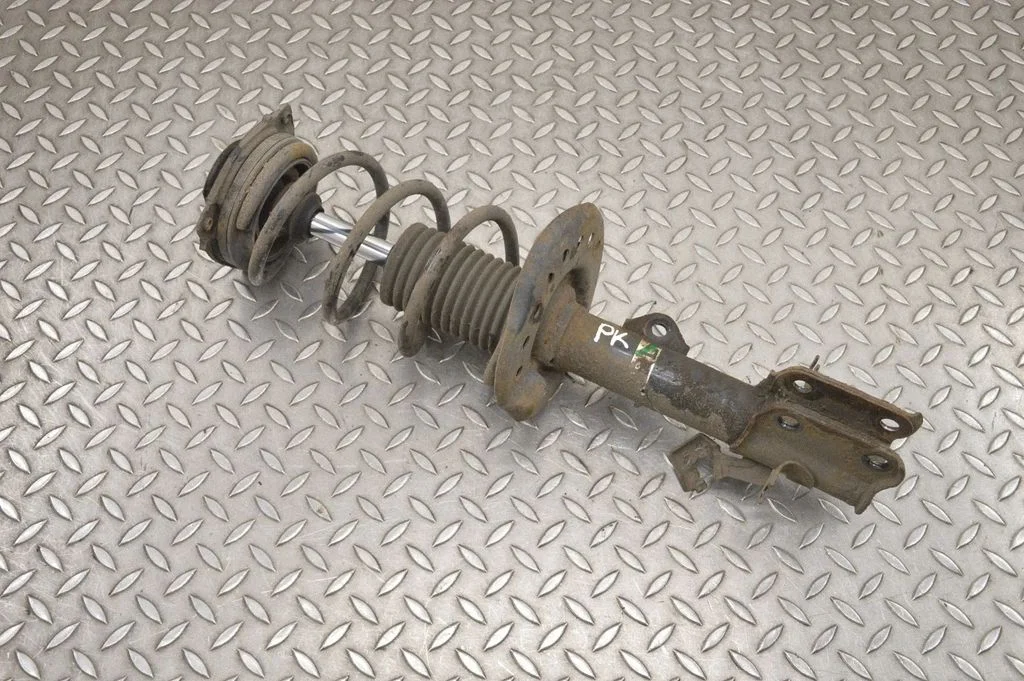 Front shock absorber/damper – left
