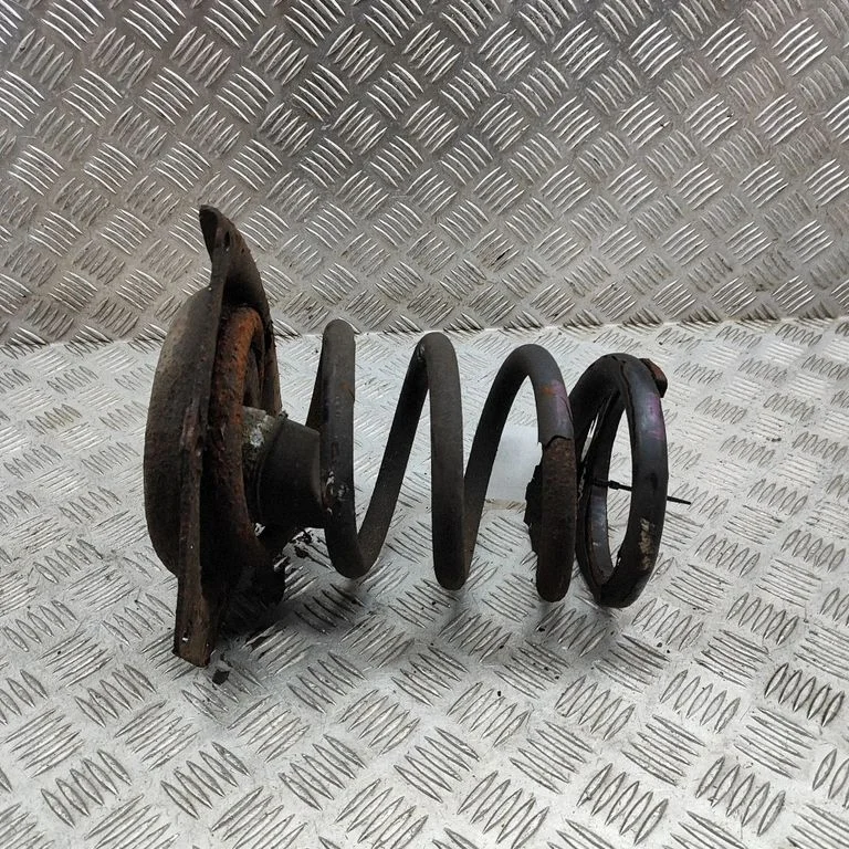 Front coil spring 23140189AA