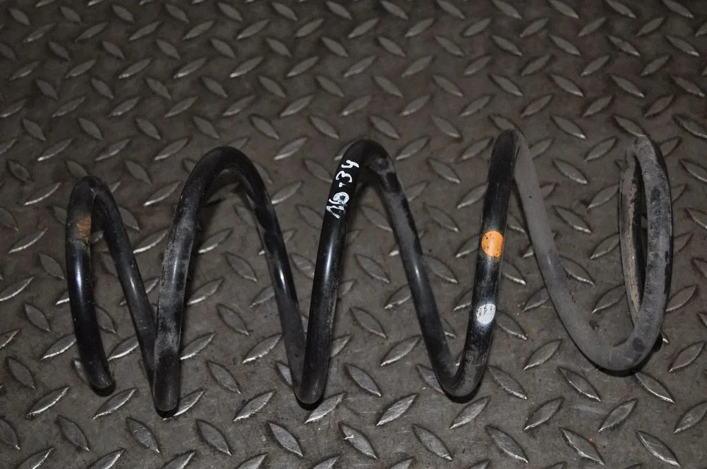 Front coil spring – left