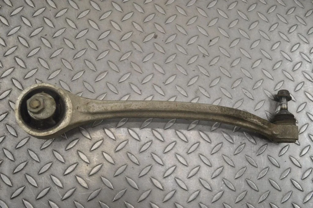Front lower control arm/wishbone – left