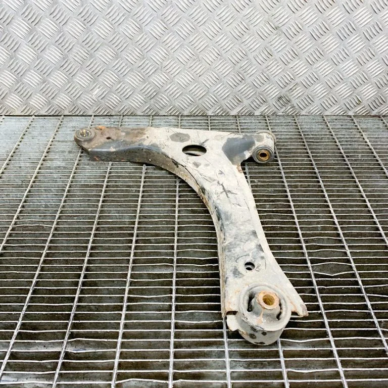 Front lower control arm/wishbone – left