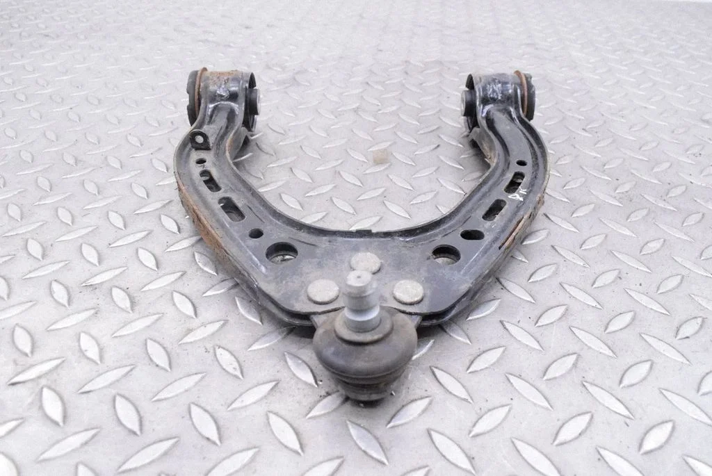 Front lower control arm/wishbone – left