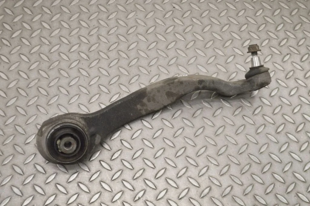 Front lower control arm/wishbone – left