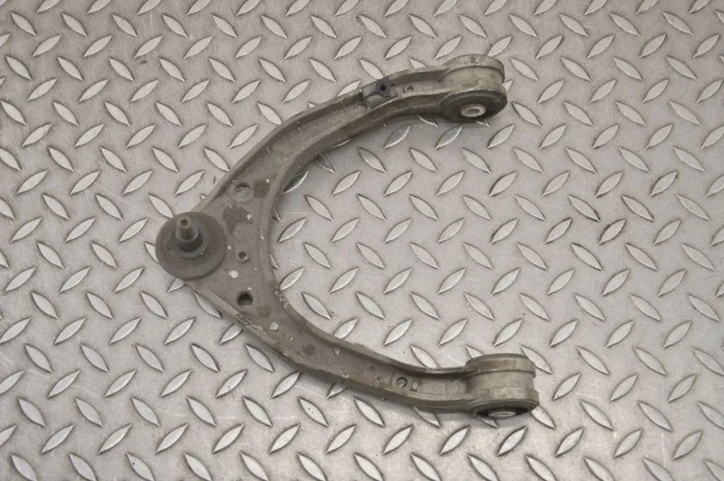 Front lower control arm/wishbone – left