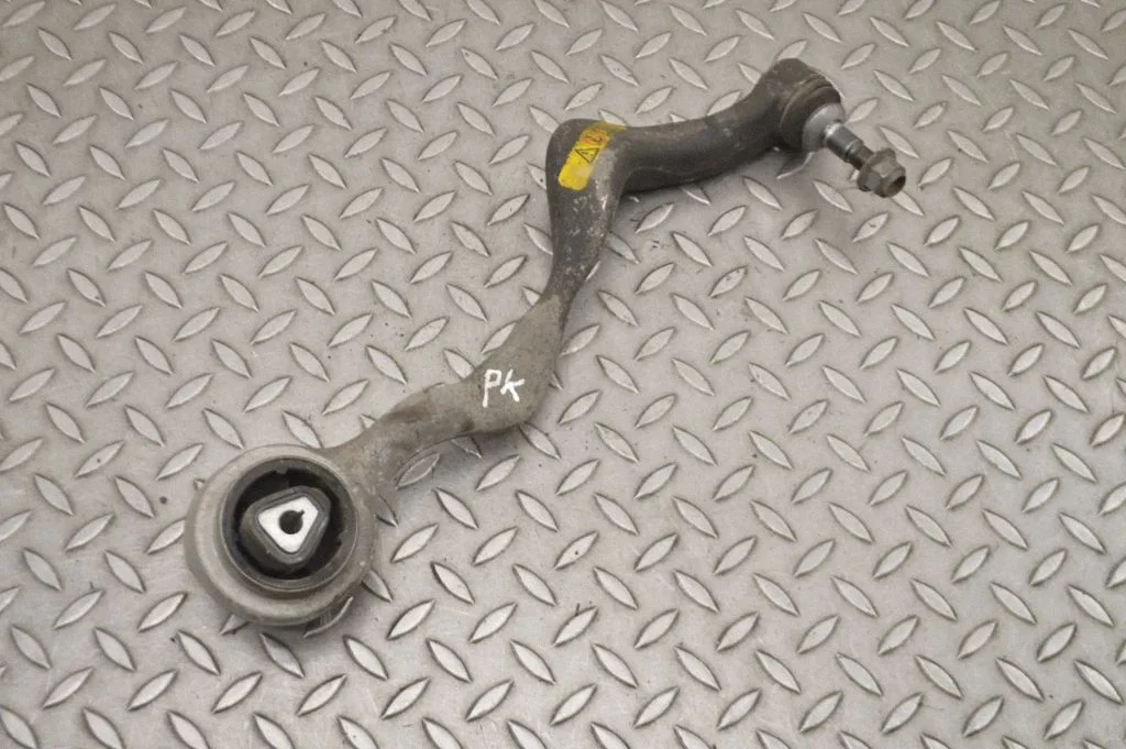 Front lower control arm/wishbone – left