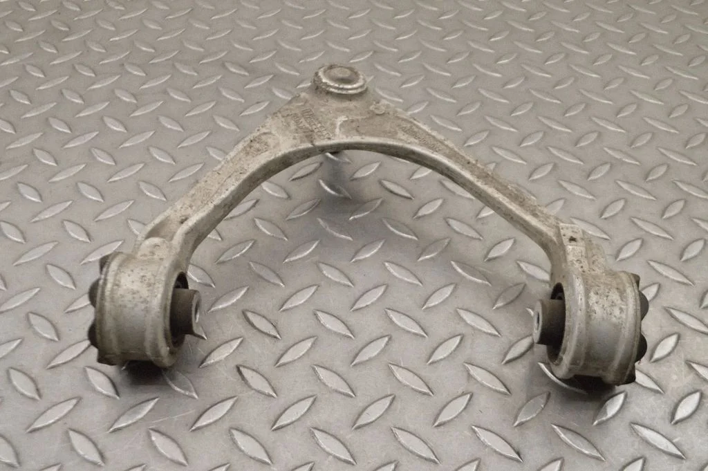 Front lower control arm/wishbone – left