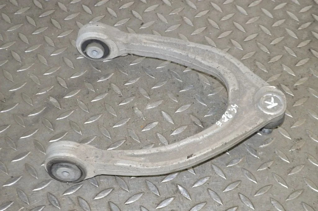 Front lower control arm/wishbone – left