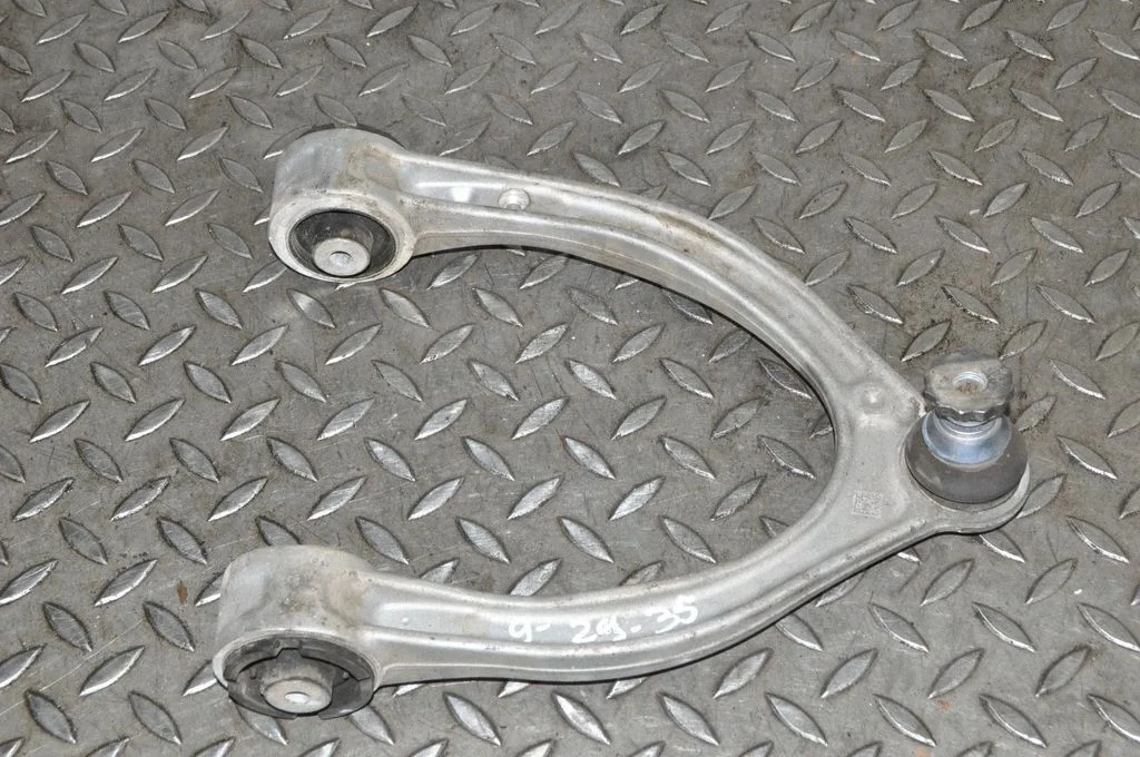 Front lower control arm/wishbone – left
