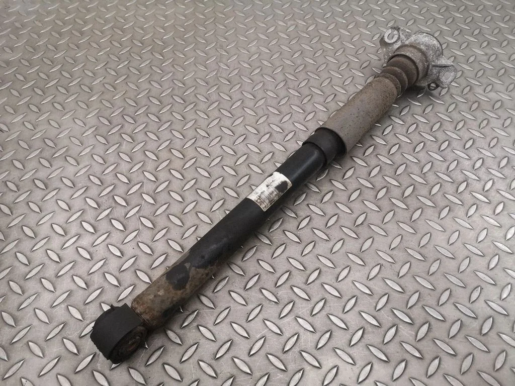 Tagumine amortisaator – vasak