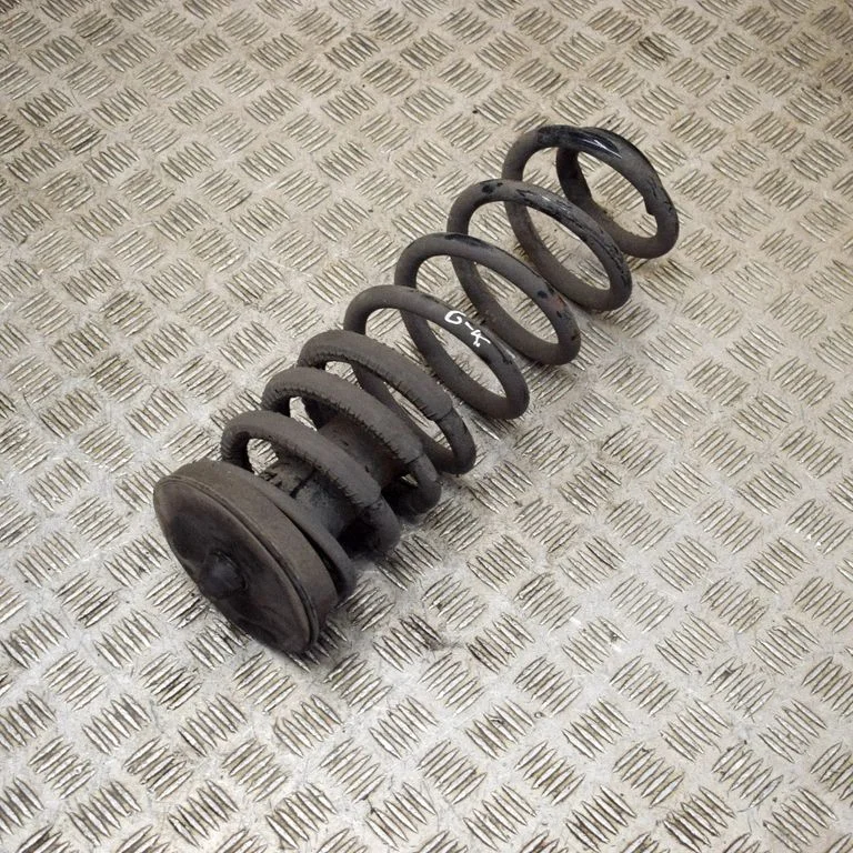 Rear coil spring – left