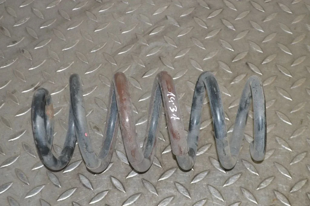 Rear coil spring – right
