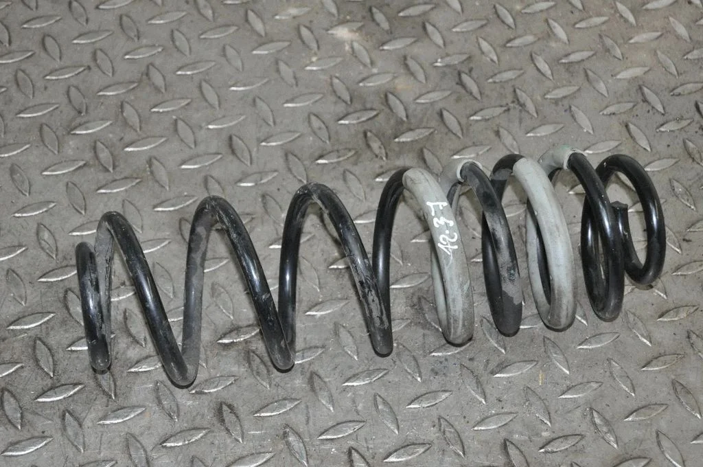 Rear coil spring – right