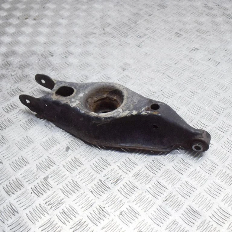 Rear upper control arm/wishbone – left
