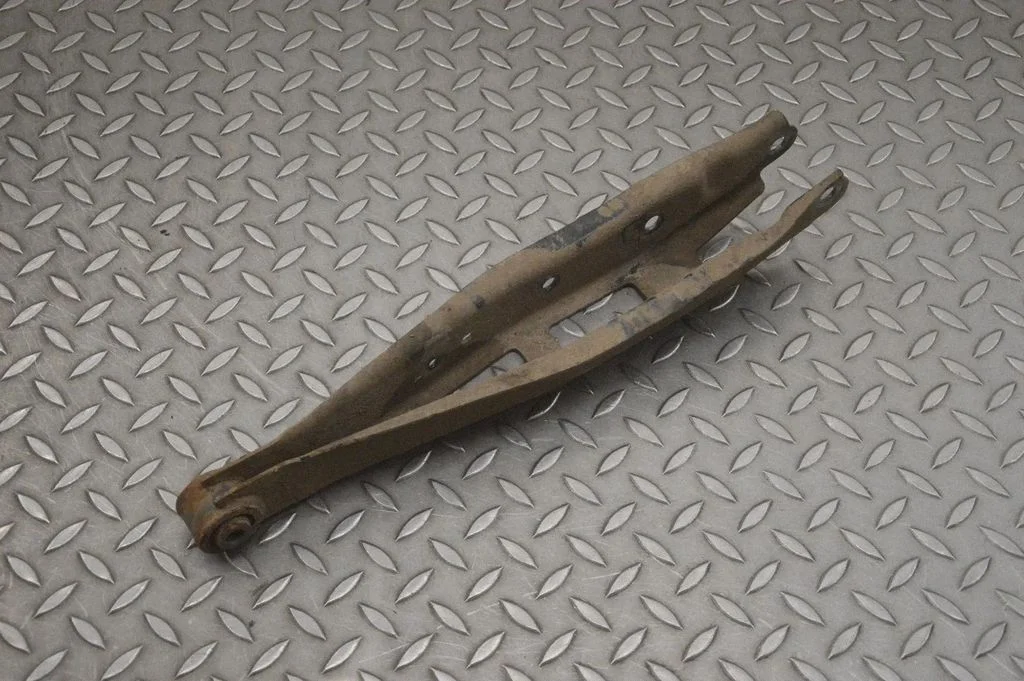 Rear upper control arm/wishbone – left