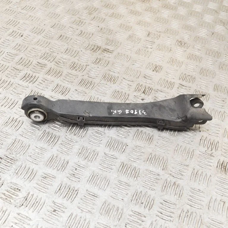 Rear upper control arm/wishbone – left