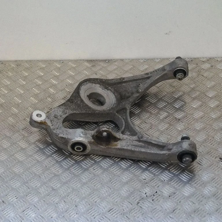Rear upper control arm/wishbone – left