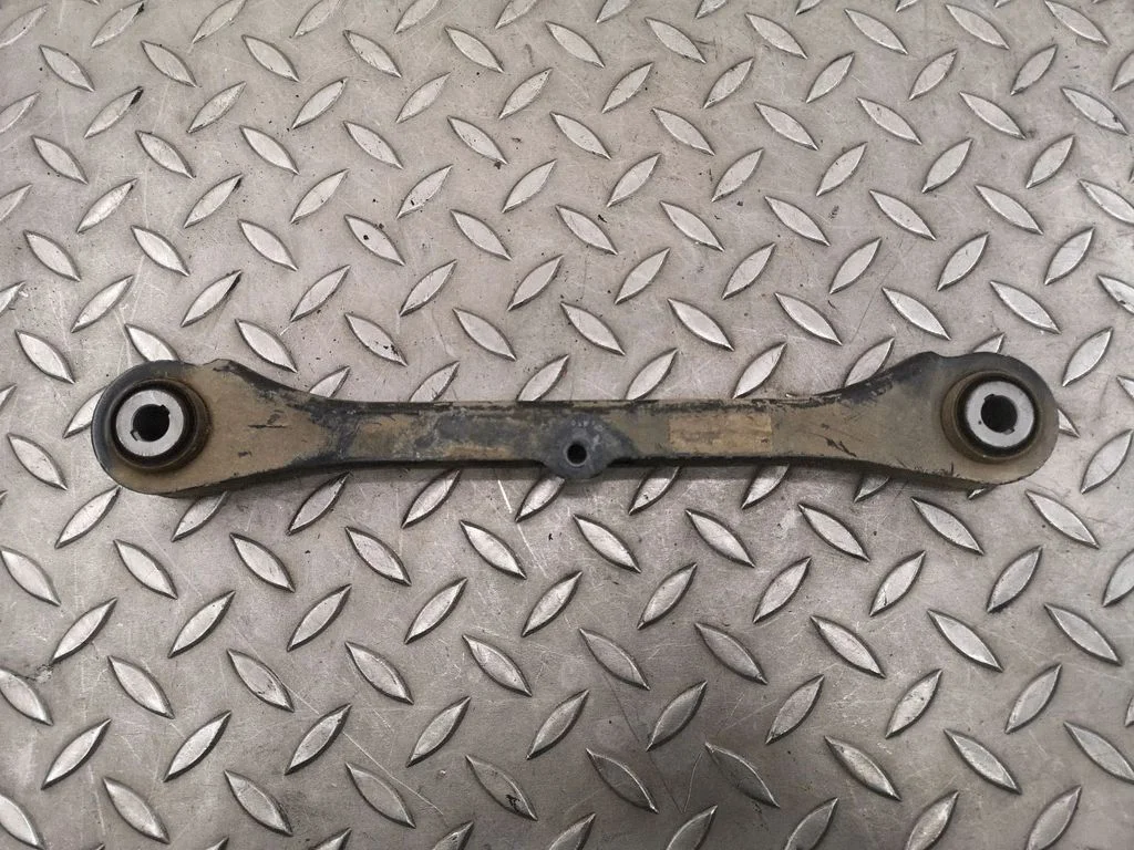 Rear upper control arm/wishbone – left