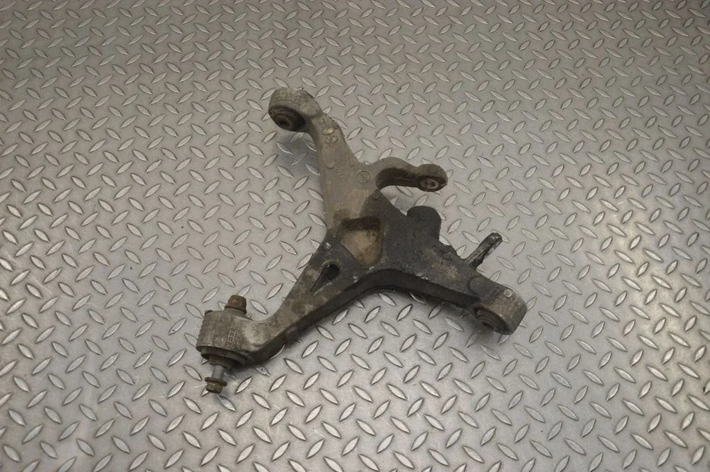 Rear upper control arm/wishbone – left