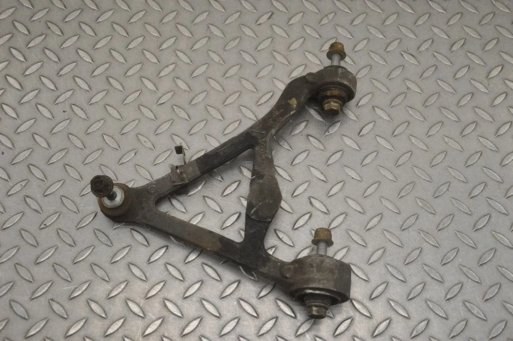 Rear upper control arm/wishbone – left