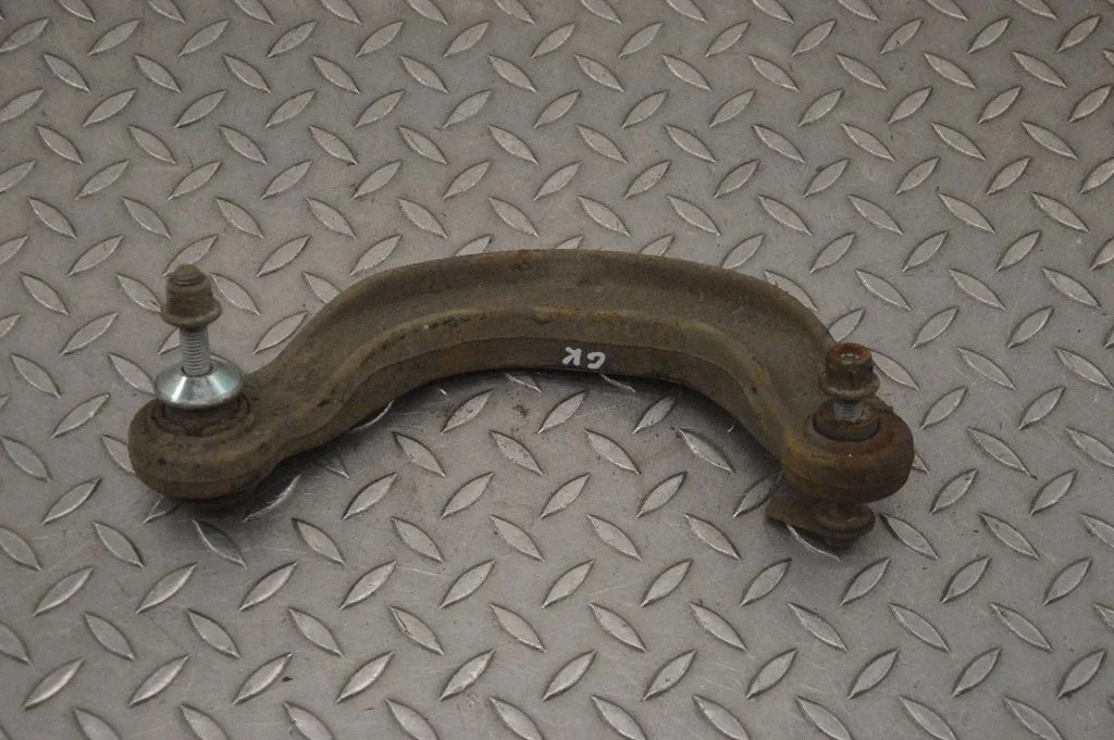 Rear upper control arm/wishbone – left