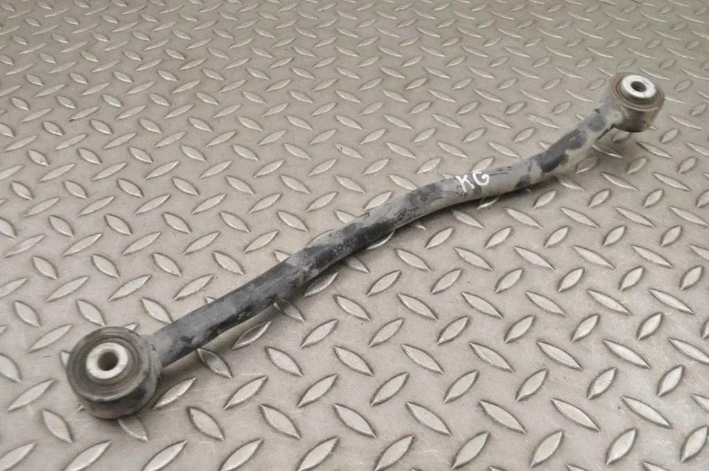 Rear upper control arm/wishbone – left