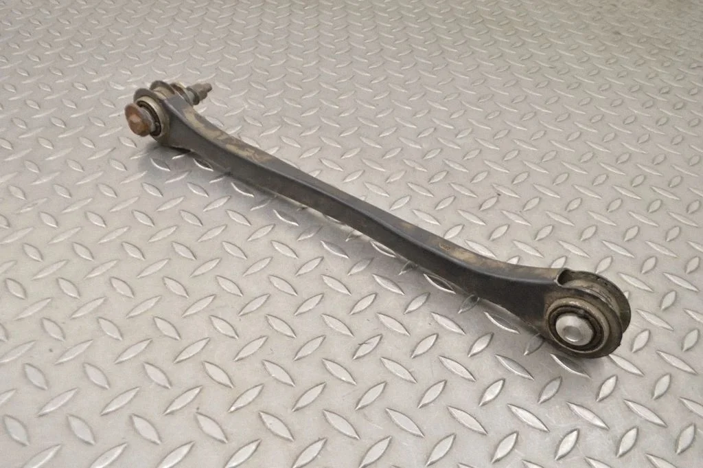 Rear upper control arm/wishbone – left