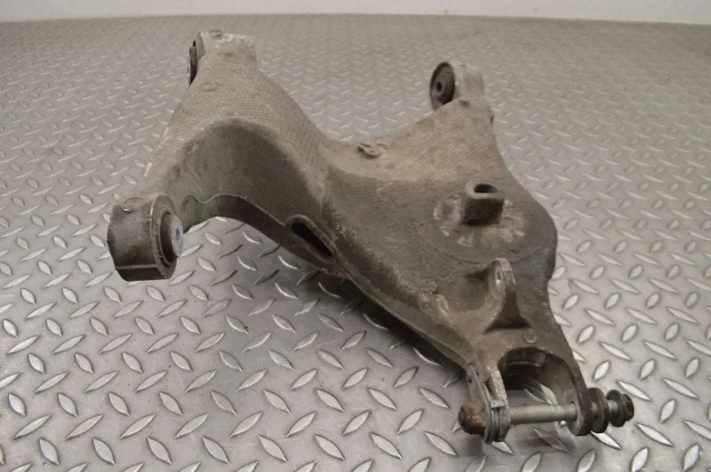 Rear upper control arm/wishbone – left