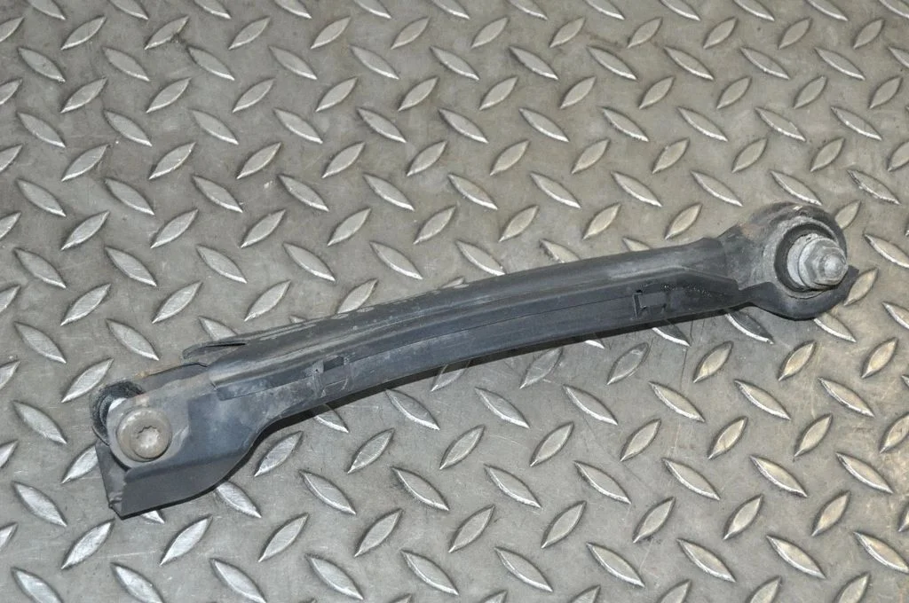 Rear upper control arm/wishbone – left
